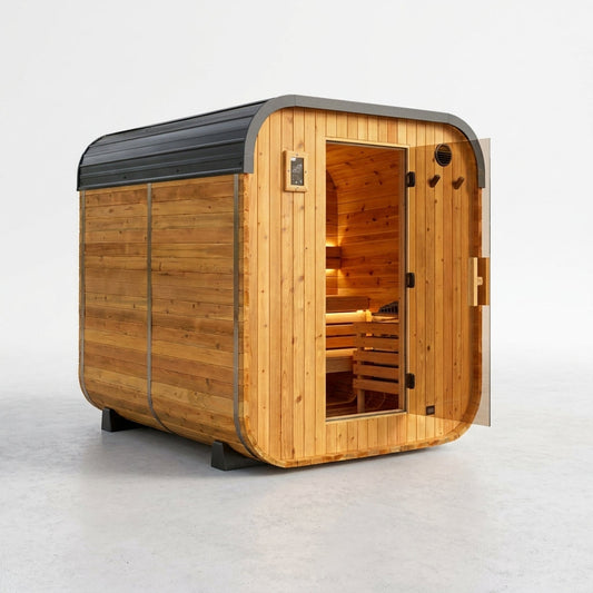 Lennon 6-Person Outdoor Cedar Traditional Wet/Dry Cube Sauna with 9Kw Electric Heater, Wi-Fi Control, LED Lights — Studio Shot